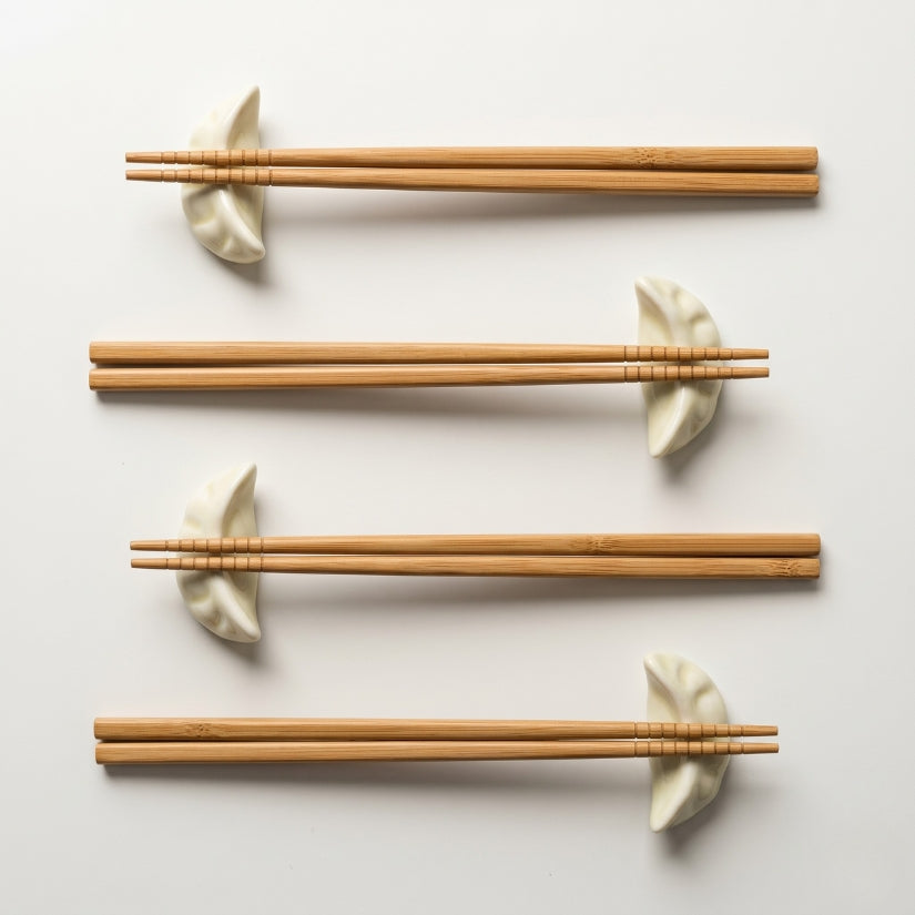 Three pairs of wooden chopsticks on a white background with dumplings. chopstick rest, dumpling chopstick holder, ceramic tableware, Asian dining accessories, dim sum gift, Japanese table decor, chopstick stand set
