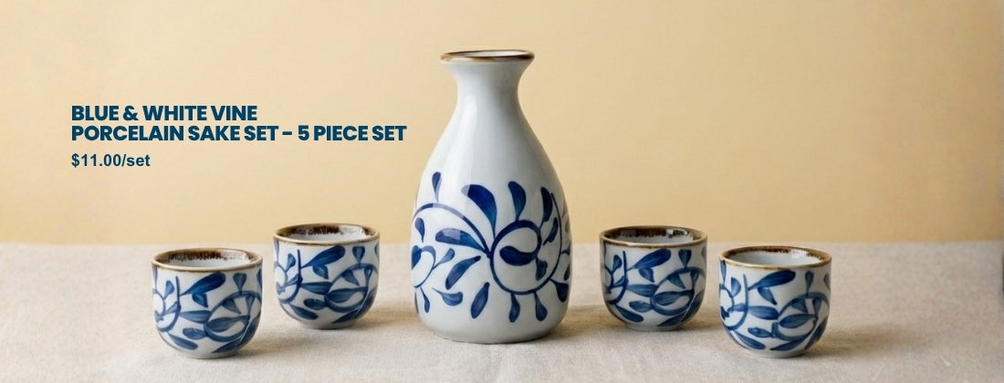 Blue and white vine porcelain sake set with five pieces on a beige background